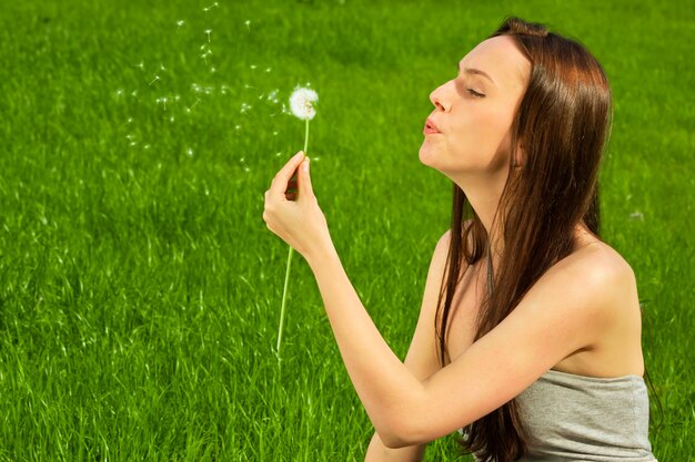 woman with dandelion