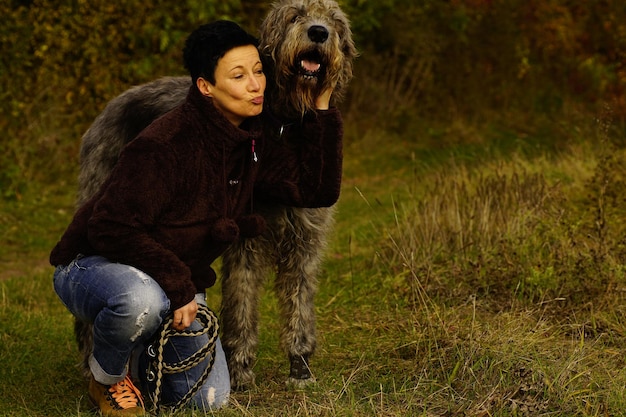 woman with dog outdoors