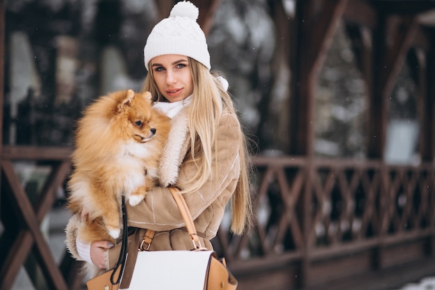 Woman with dog in winter