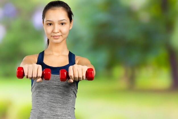 Woman with a dumbbell