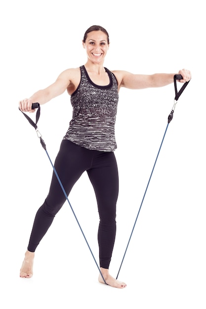 Woman with elastic band doing exercises