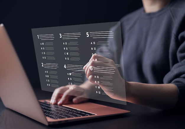 Premium Photo | Woman with evaluating questionnaire on online laptop ...