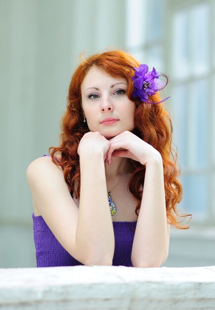 Woman with a flower in her hairs