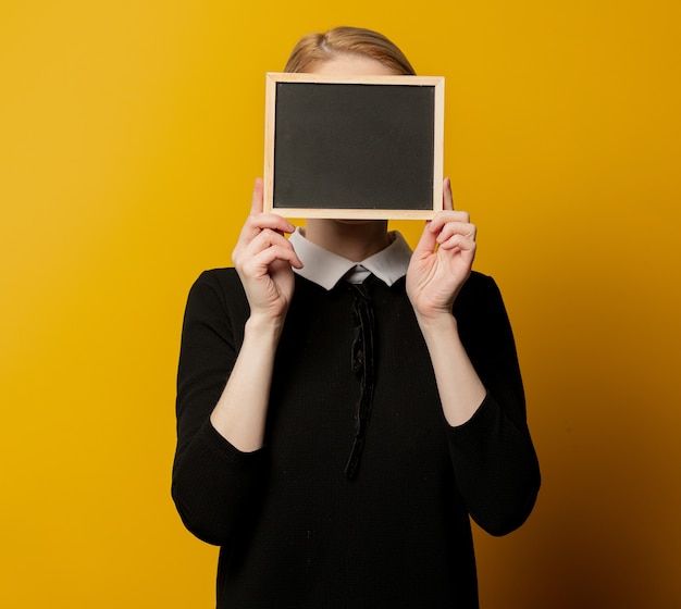 Woman with a frame board