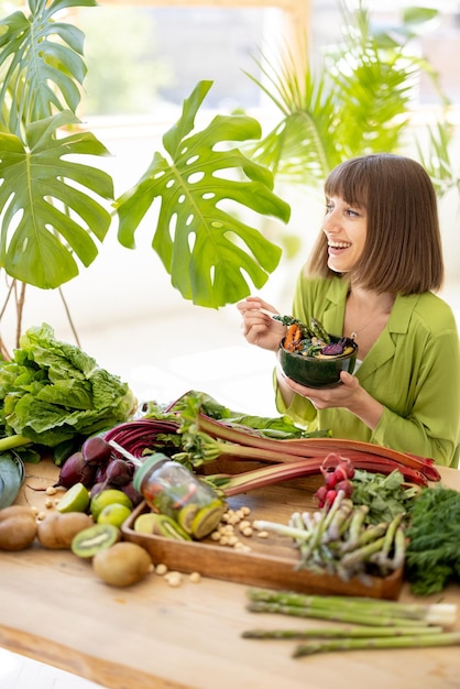 Woman with fresh healthy food indoors