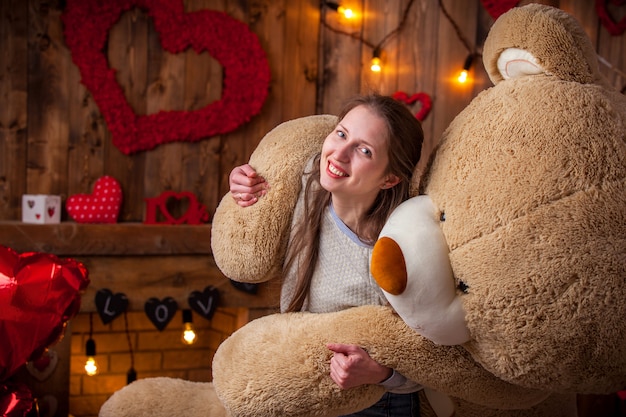 woman with giant teddy bear