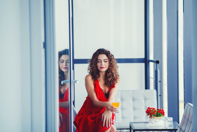  woman with a glass of juice