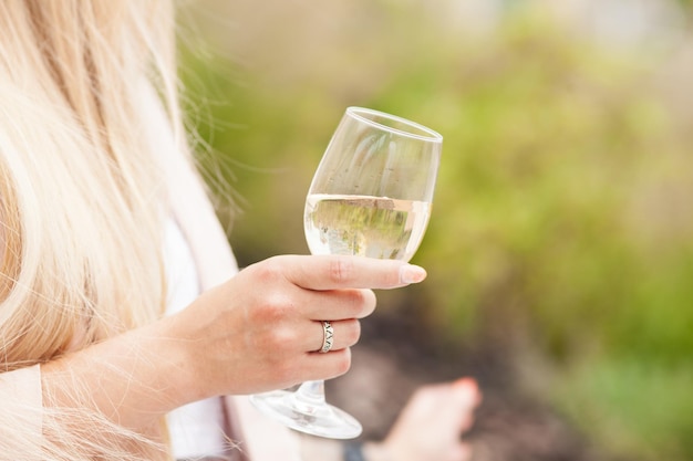 woman with glass of wine.