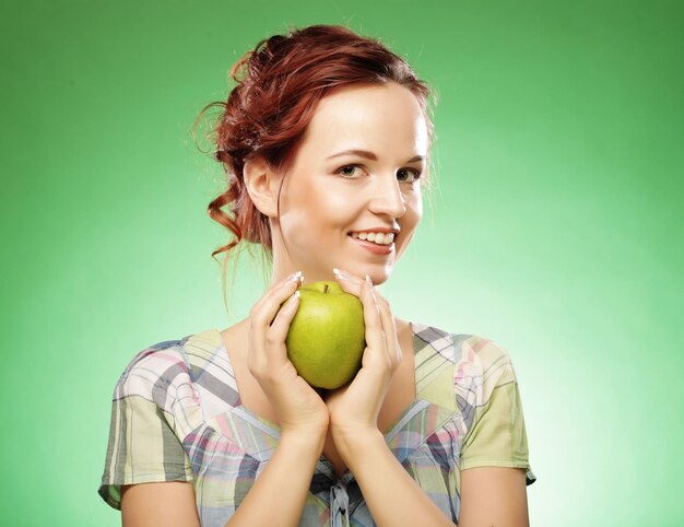 Woman with green apple