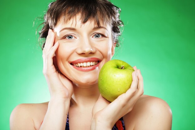 Woman with green apple