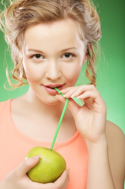 Woman with green apple