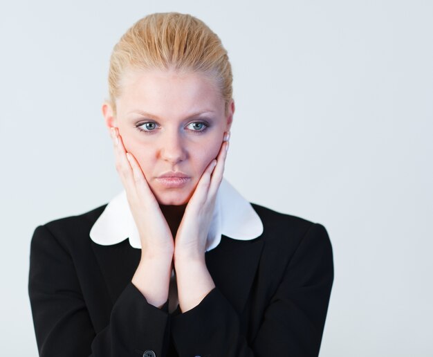 Woman with hands on her face