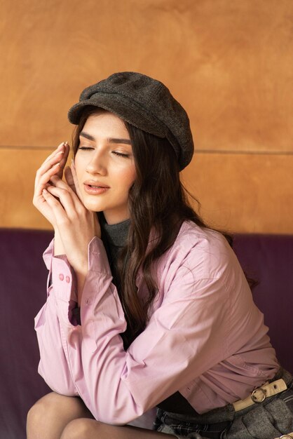 a woman with a hat that says  she is wearing a hat