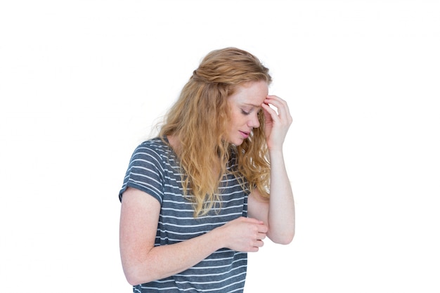  Woman with headache pinching her nose