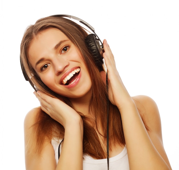 Woman with headphones listening music