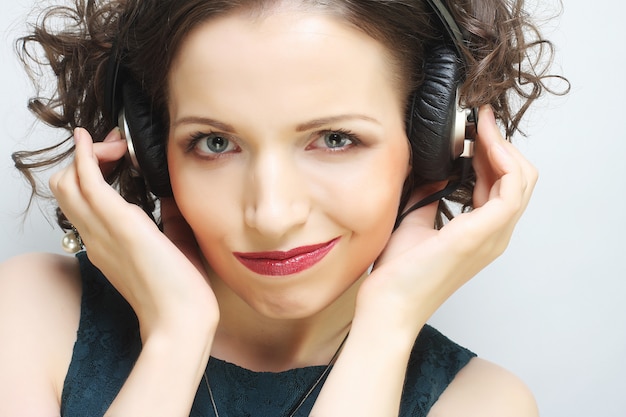 woman with headphones listening to music