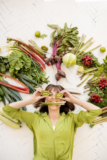 Woman with healthy food ingredients above her head