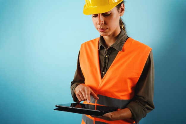 Woman with helmet who work in a warehouse                           person