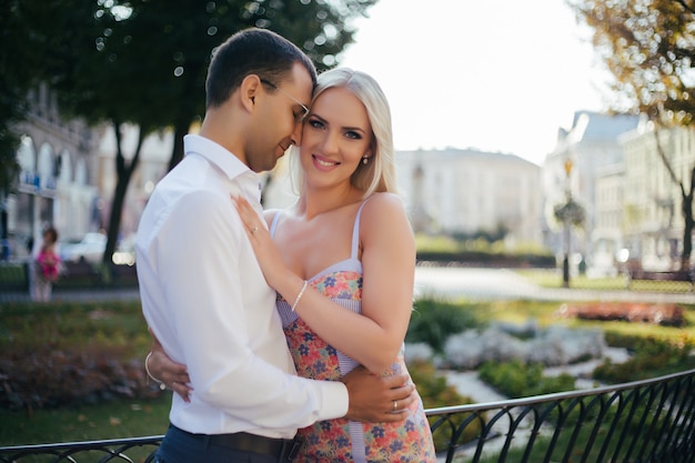 Woman with her husband walking around the city