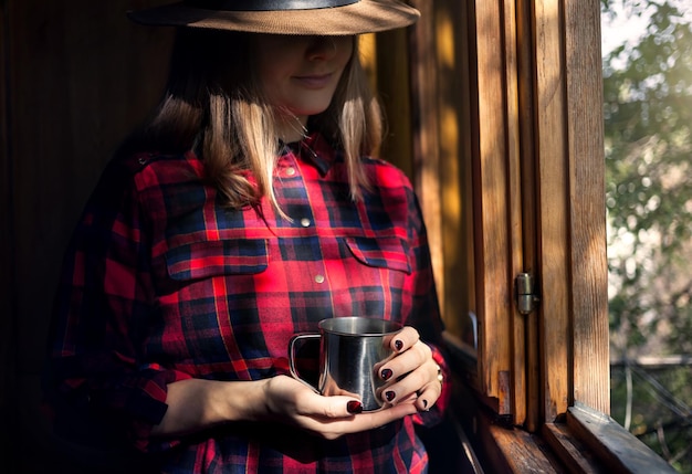 Woman with hot tea cup