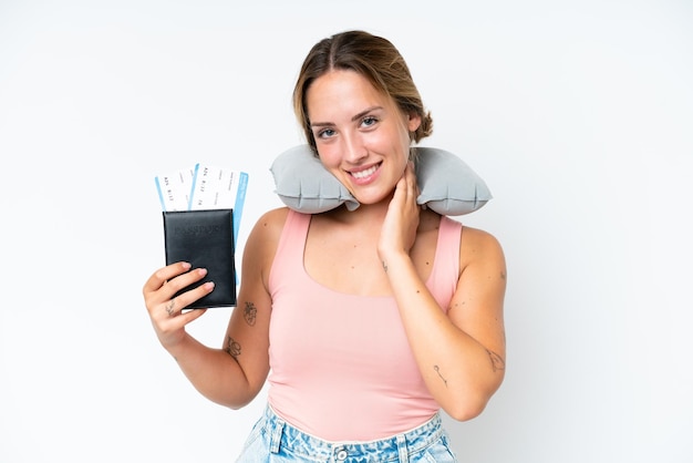 Woman with Inflatable Travel Pillow over isolated background laughing