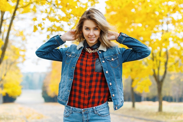 Woman with a jeans jacket outside