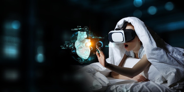 Woman with laptop enchanted by virtual reality. Mixed media