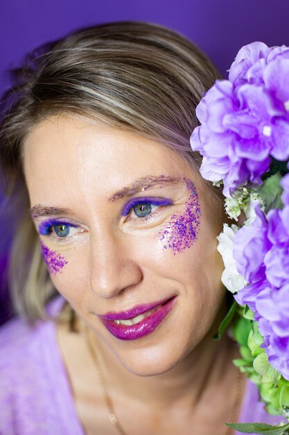 Woman with Large beautiful eyes with color lash