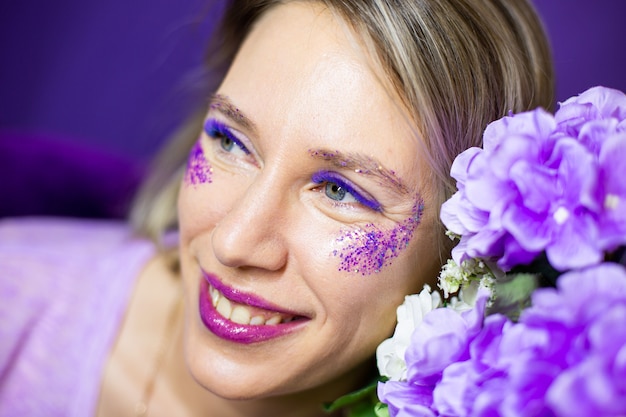 Woman with Large beautiful eyes with color lash