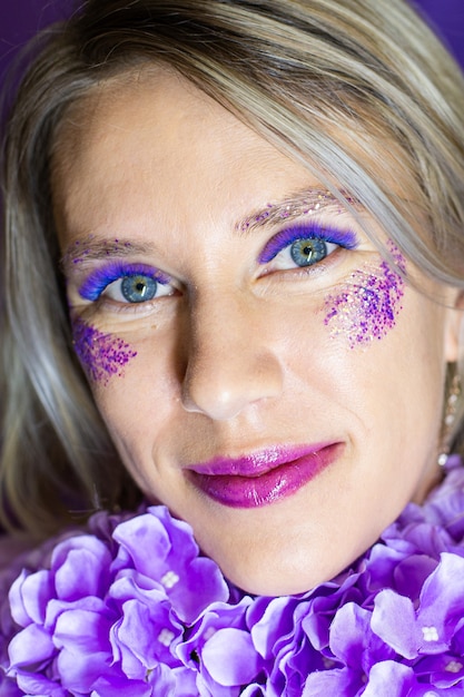 Woman with Large beautiful eyes with color lash