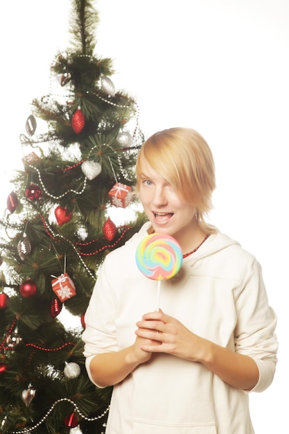 Woman with lolipop and tree