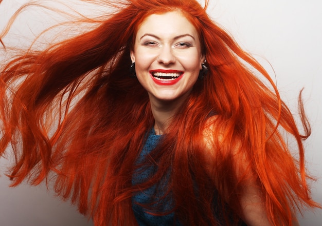 Woman with long flowing red hair