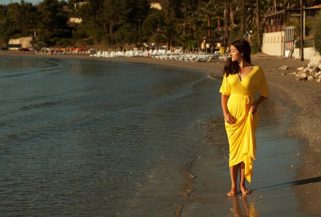 Woman with long yellow dress