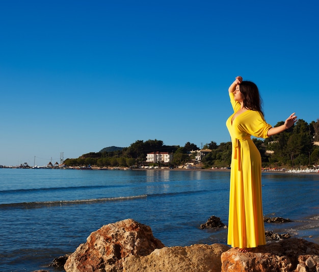 Woman with long yellow dress