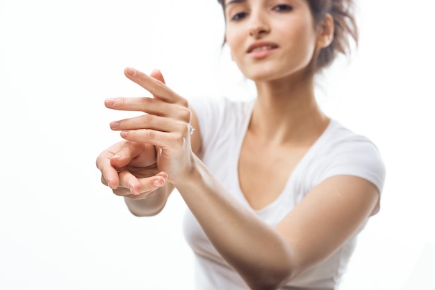 Woman with lotion in hands skin care cosmetology moisturizing