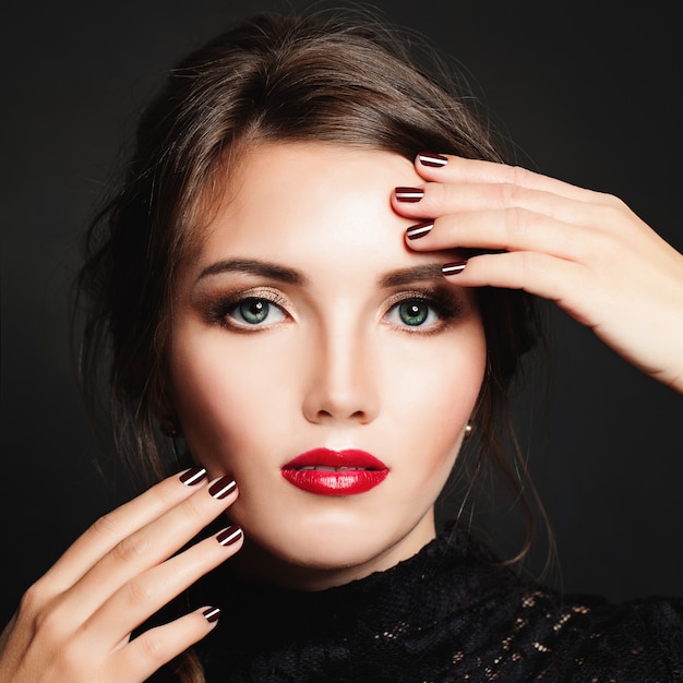 Woman with Makeup and Manicure Nails