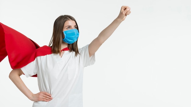 Photo woman with mask posing