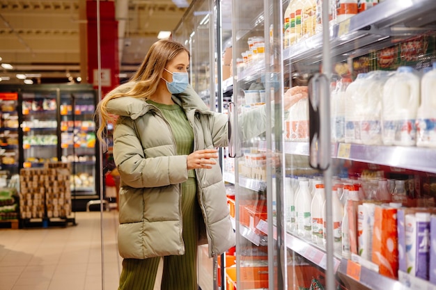 woman with mask at supermarket