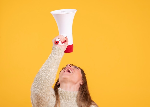 Woman with a megaphone yelling