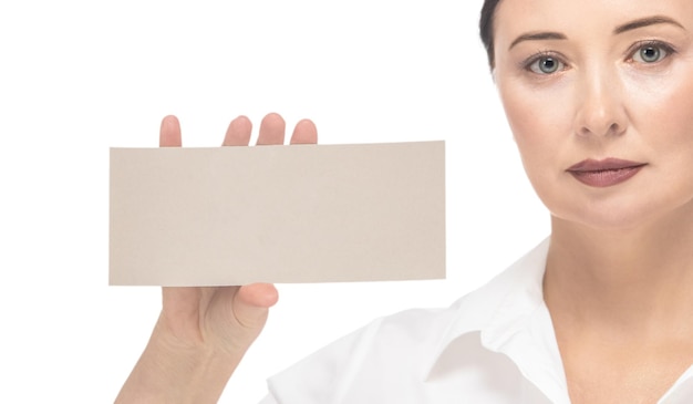 Woman with a mockup in her hand on a white background isolate