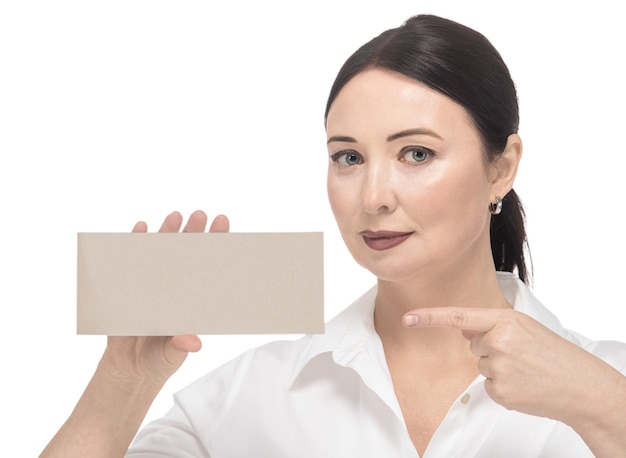 Photo woman with a mockup in her hand on a white background isolate