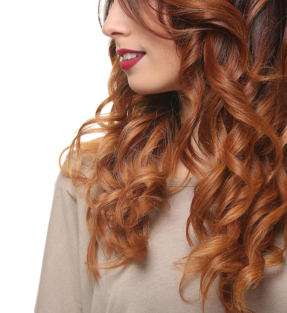 Woman with modern hairstyle on white background