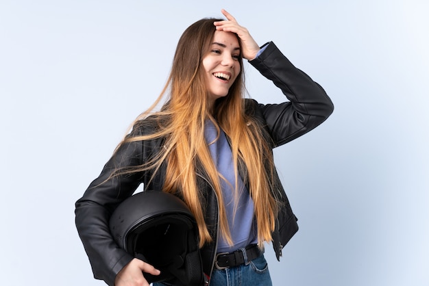 Woman with a motorcycle helmet laughing