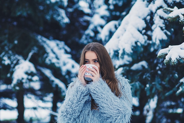 Woman with mug of tea