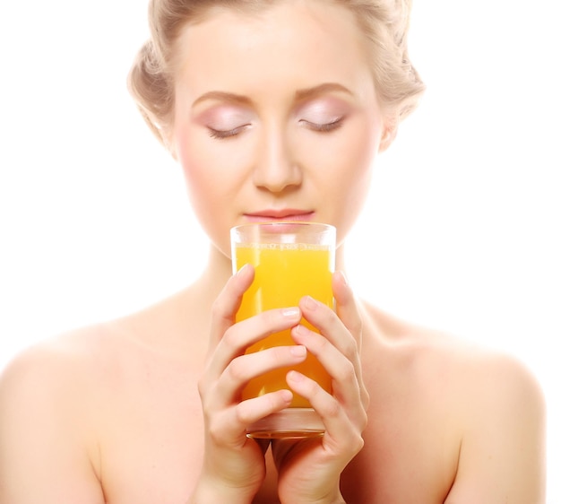 Woman with orange juice isolated on white