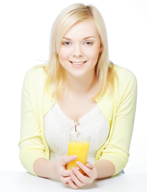 Woman with orange juice on white background