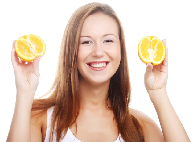 Woman with oranges in her hands