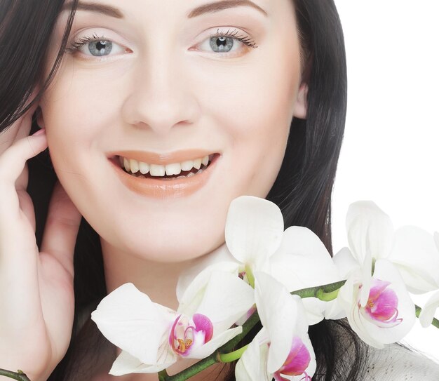 Woman with orchid flower