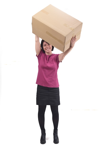 Photo woman with package on white