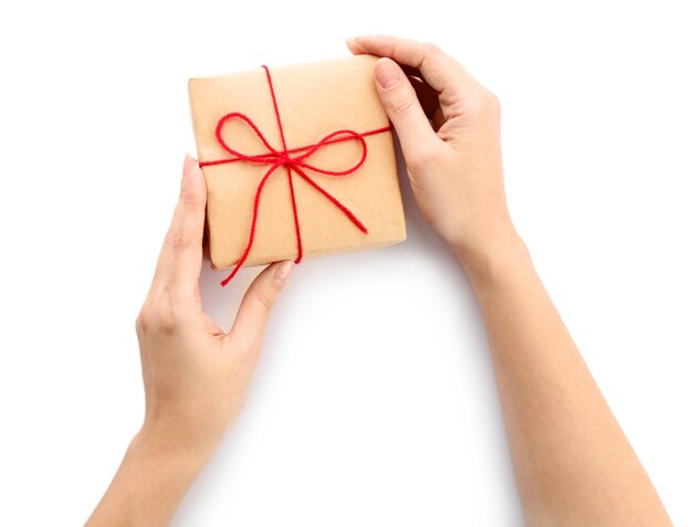 Woman with parcel gift box on white background